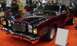 1979 Ford Ranchero - This 1979 Ford Ranchero features a striking black and maroon two-tone paint scheme with red racing stripes.