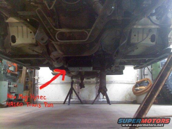 Underside view of vehicle showing new Mag-Hytec 4R100 trans pan