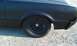 1966 Oldsmobile Cutlass - Rear quarter panel and wheel of a 1966 Oldsmobile Cutlass.
