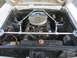 1964 Ford Ranchero - 1964 Ford Ranchero engine bay with aftermarket bracing installed.