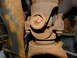 1995 Ford Bronco - Close-up view of a rusty driveshaft universal joint, likely from the rear chassis of a vehicle.