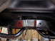 1995 Ford Bronco - Underside view of a 1995 Ford Bronco's rear chassis and suspension system.