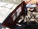 1960 Ford Ranchero - The engine bay of an orange vehicle shows various engine parts and a cloth draped over some components.