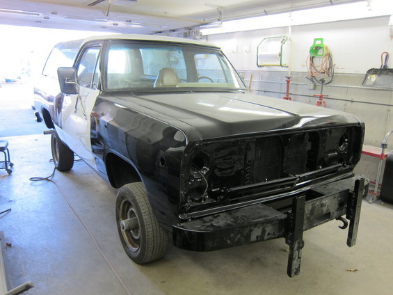 Dodge Ramcharger with front end disassembled, undergoing bodywork