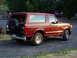 1993 Ford Bronco - This 1993 Ford Bronco is seen parked outdoors with a spare tire mounted on the rear.