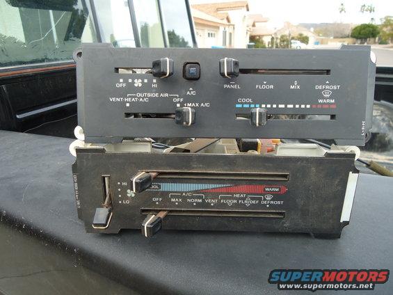 Climate control panel with knobs and sliders for fan speed, temperature, and air direction