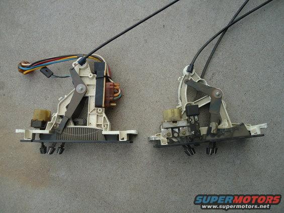 Two car door lock actuator mechanisms with cables and wiring