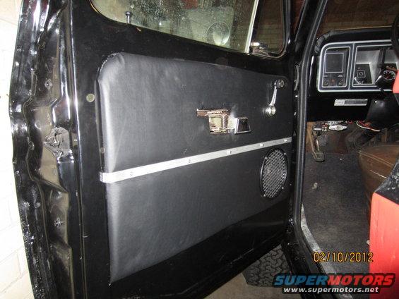 1979 Ford Bronco interior door panel with speaker and chrome handle