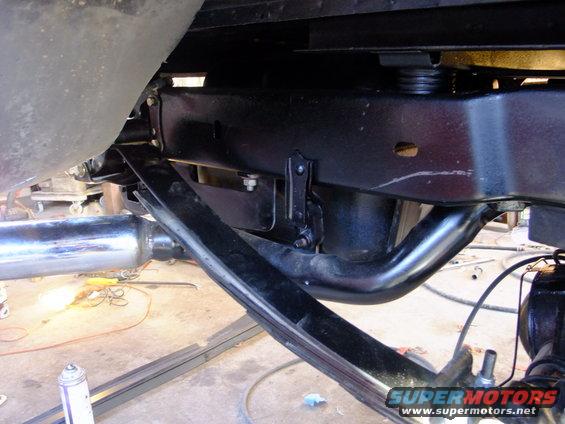 Close-up of rear leaf spring and frame mounting bracket