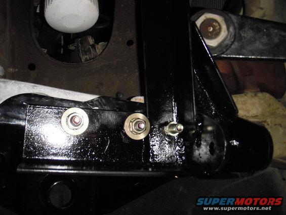 I really tried to get as much length as possible, that is why the angle extends beyond the frame. If I have any issues I will add a couople gussets between the spring bucket and the trac bar mount and weld them together.