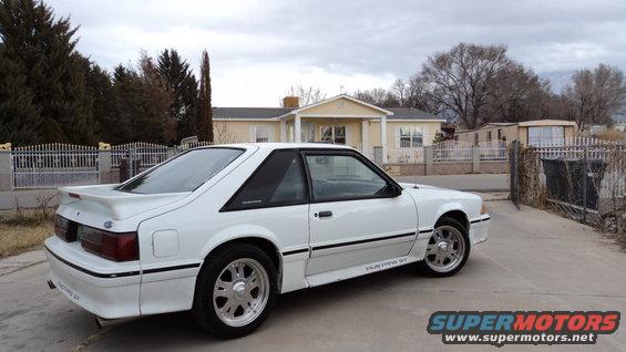 White 1989 Ford Mustang GT coupe from the rear quarter view