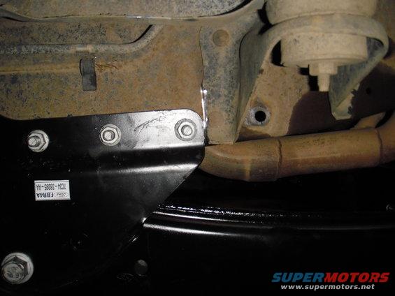 Where the bracket lives, this centers the axle in the fender. Is the same place as mwalsh put his.