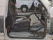 1991 Ford Bronco - Interior view of a 1991 Ford Bronco, modified with a roll cage.