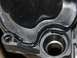 1999 Ford Crown Victoria - Close-up of a black plastic intake manifold part, showing wear and a Supermotors.net watermark.