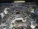 1999 Ford Crown Victoria - Close-up view of an engine's intake manifold system, showing intricate plumbing and wiring.