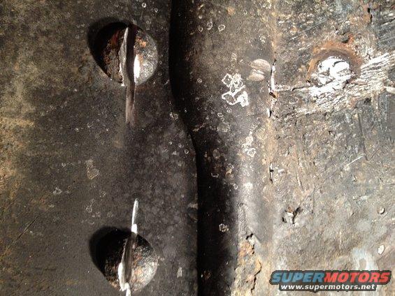 031.jpg easiest way to remove ford rivets. cutoff wheel down the middle and use an air hammer to punch of the tops and then hit them out.