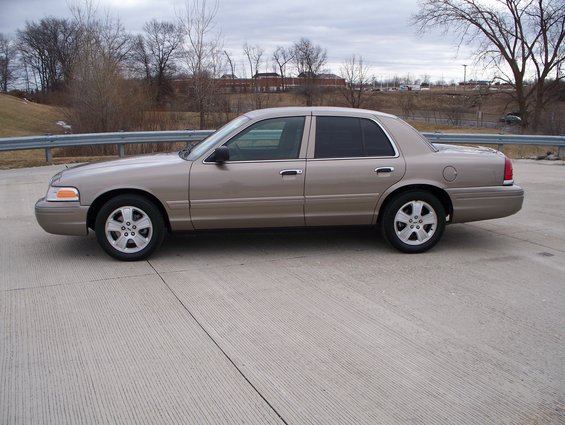 Tan 2007 Ford Crown Victoria side view