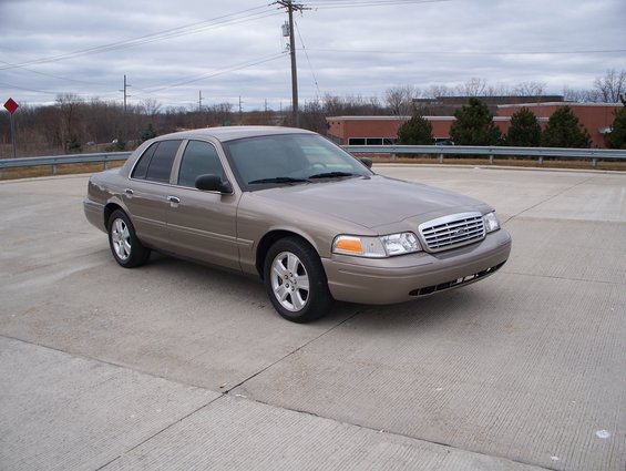 2007 Ford Crown Victoria parked on concrete lot