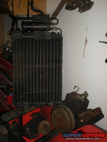 Car AC evaporator core with attached compressor and pulley