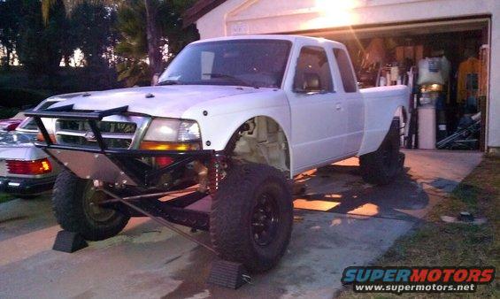 White 1992 Ford Ranger with custom bumper and lifted suspension