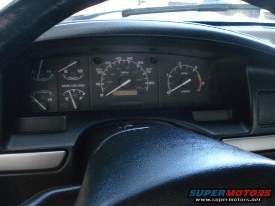 1994 Ford F-250 dashboard with speedometer, tachometer, fuel, and temperature gauges