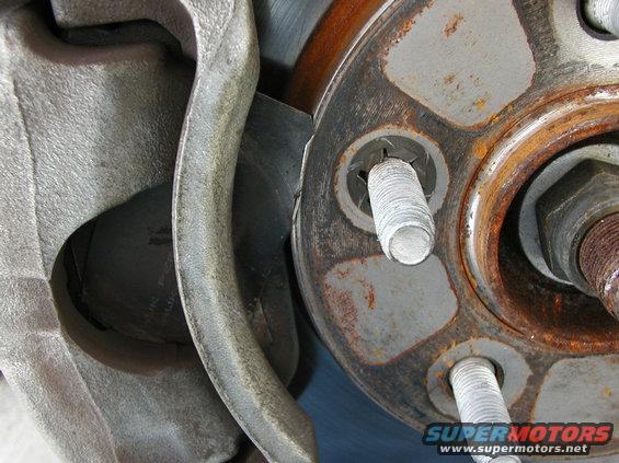 loose-hawk-pad-shim.jpg Hawk HPS brake pad with the shim slipped out of place.