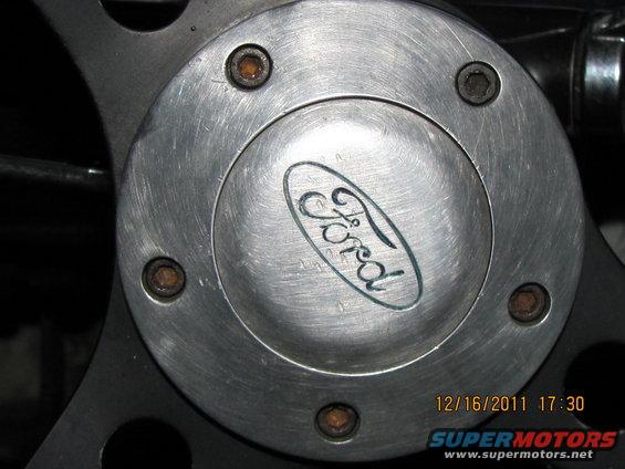 Close-up of a Ford logo on a steering wheel hub