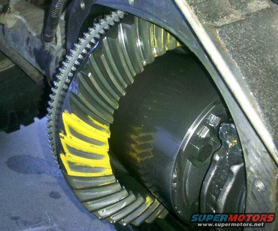 Close-up of differential gears with yellow markings