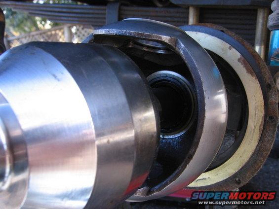 Close-up of a disassembled CV joint with metal components