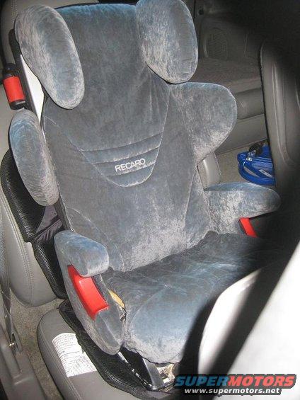 Gray Recaro car seat with red accents inside a vehicle
