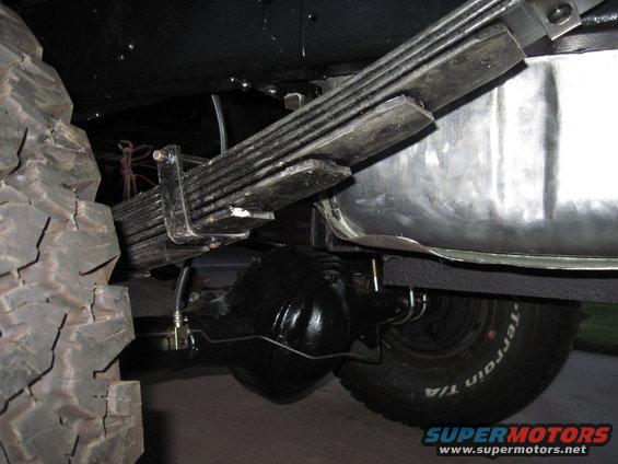 Rear axle and leaf springs with BFGoodrich Trail-Terrain tire visible