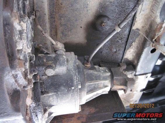 close-up of vehicle's transfer case and driveshaft connection
