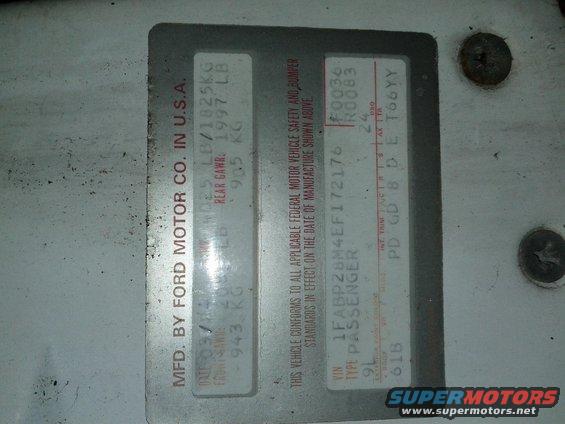 Vehicle identification plate with VIN 1FABP28M4EF172176 and manufacturing date 1997