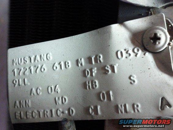 Mustang VIN plate with stamped numbers and letters