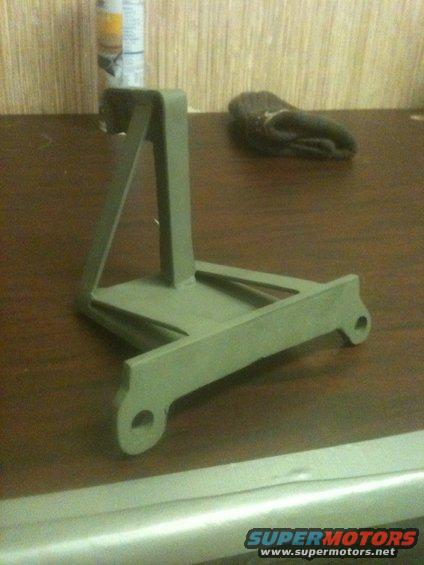 Gray metal bracket with triangular support and mounting holes