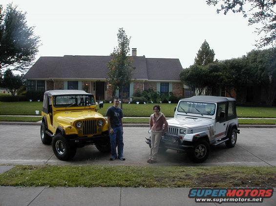 Yellow Jeep CJ and silver Jeep Wrangler parked in front of a house with two people standing between them