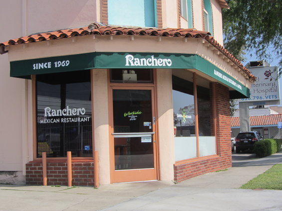 Ranchero Mexican Restaurant storefront with green awning that says 'Since 1969'