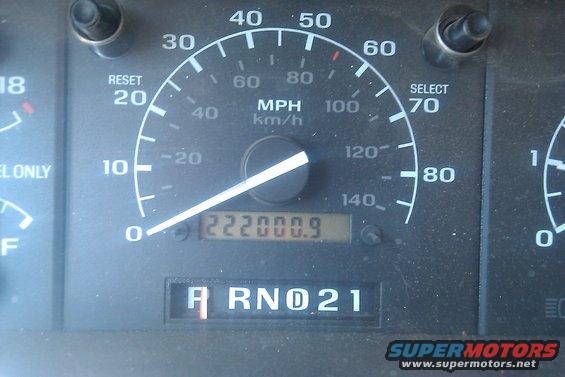 Odometer shows 222000.9 miles. Gear selector is in 'D' for drive