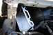 1976 Ford Ranchero - Close-up of a vehicle's battery tray and radiator support structure.