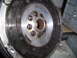2003 Hyundai Tiburon - This image shows a close-up view of a vehicle's flywheel, a critical component of the powertrain system.