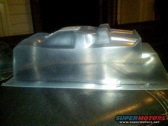 Clear plastic car body shell with molded details