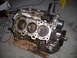 2003 Hyundai Tiburon - This is a disassembled engine block, showing the cylinders and pistons. It is not a complete vehicle.