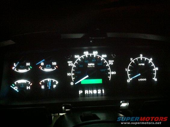 img_00681.jpg LED lights installed in cluster. I think it looks great. Heater controls cant really be done. I tried and messed up my panel and now have to replace it. Ill get a picture of the LED I used up soon. All of the dash trim is off in this picture by the way...