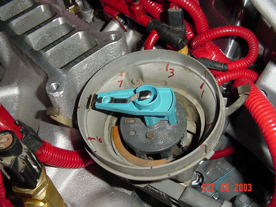 valve-adjustment-062.jpg Pull off the distributor cap, and mark off where the rotor will be when it fires each cylinder...(8 evenly spaced lines, and the firing order written in there CCW