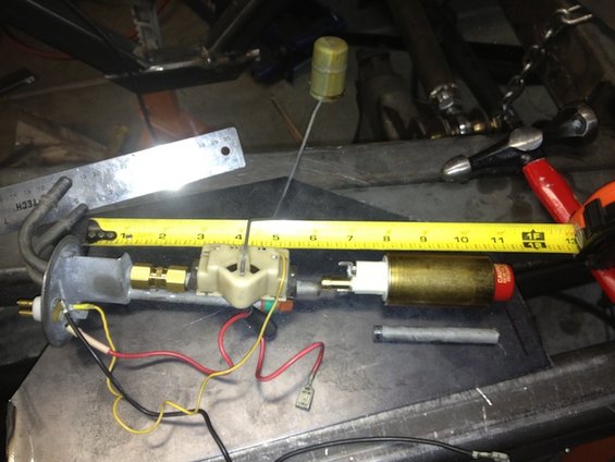 Fuel pump and sender assembly with a tape measure and ruler