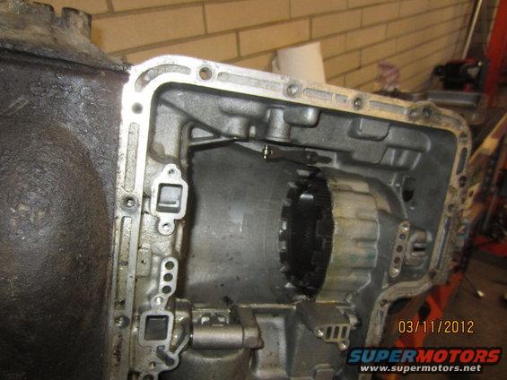 Open automatic transmission case showing planetary gear set and torque converter clutch
