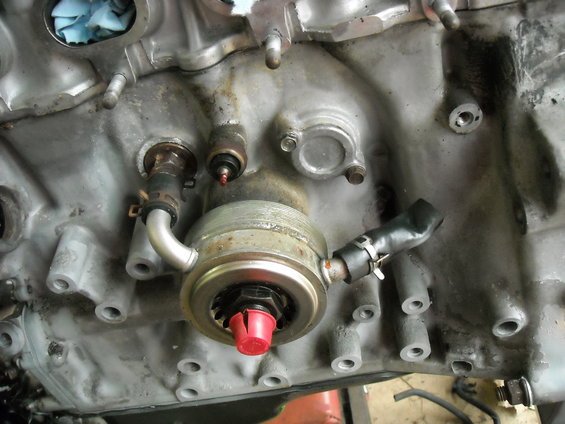 Engine block with oil filter housing and red cap