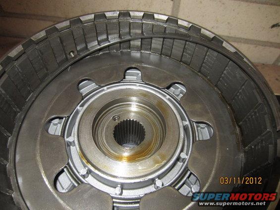 Close-up of an automatic transmission clutch pack with splined input shaft