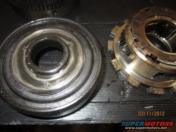 Transmission clutch pack and input shaft splines on a dark surface