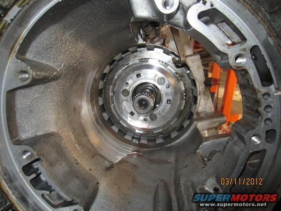 Transmission torque converter housing interior with splined shaft